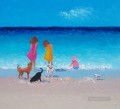Mädchen und Hunde am Strand